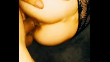 Amateur couple filming video in hotel