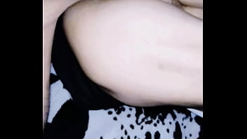 Amateur couple filming video in hotel