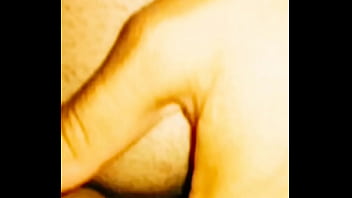 Amateur couple filming video in hotel