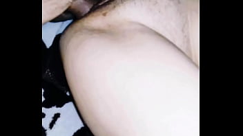 Amateur couple filming video in hotel