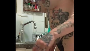 Washing dishes in the kitchen