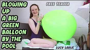 Blowing Up A Big Green Balloon By The Pool thumbnail