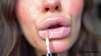 Sensual creamy nude lipgloss kiss