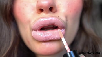 Sensual creamy nude lipgloss kiss