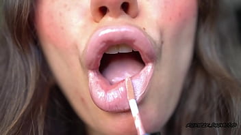 Sensual creamy nude lipgloss kiss