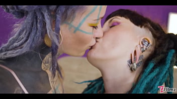 Tattooed hottie in a wild ffm threesome with two alternative teens