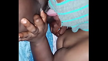 Lesbians sucking and fingering each other