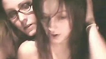 Milf lesbian with glasses posing on webcam