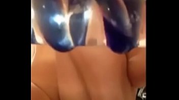 Sexy cutie plays with glass cock