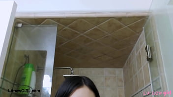 Shy asian model enjoys a sensual bath