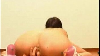 Amateur brunette stripping & rubbing hairy pussy