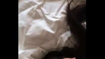 Asian milf masturbates and sucks