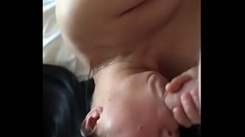 Asian milf masturbates and sucks