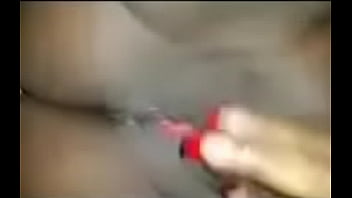 Dark skinned ebony playing with that kitty cat