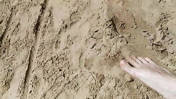 Brunette with huge tits on the beach part 1