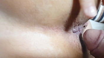 Playing with her pussy and ass rubbing his cock and thrusting slowly