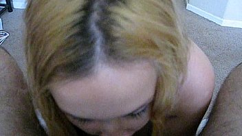 Pregnant blonde giving head