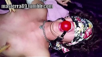 Female slave tied on bed and t