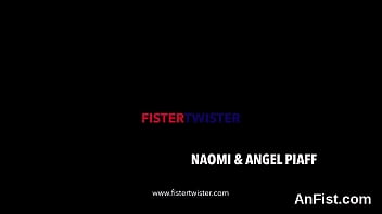 Lesbo kitten gets her shaved cunt and anal fist fucked