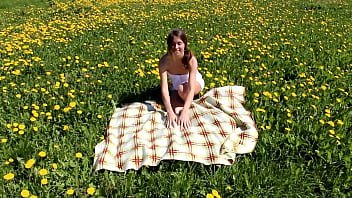 Beautiful ananta shakti masturbates pussy on a field with dandelions gb002