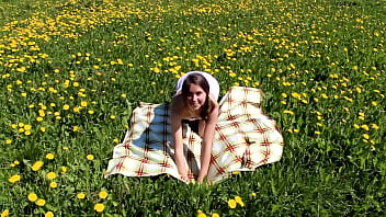 Beautiful ananta shakti masturbates pussy on a field with dandelions gb002