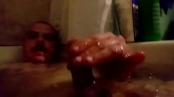 Playing with amy's cock in the bath