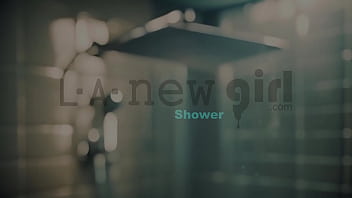 Sophisticated brunette beauty enjoys a sensual bath