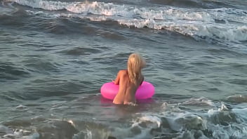 Girl agnes walks around the beach full nude with an audience