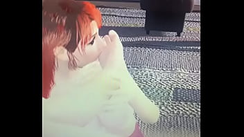 Redhead sucking male foot