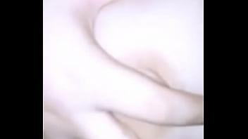 Babe squeezing her tits