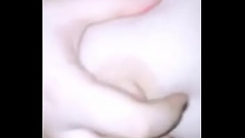 Babe squeezing her tits