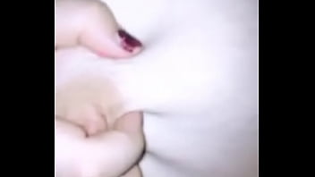 Babe squeezing her tits