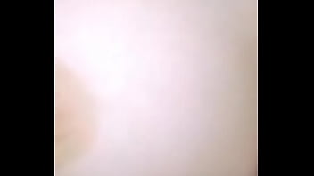 Babe squeezing her tits