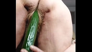 Granny fucks hairy pussy with cucumber