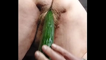 Granny fucks hairy pussy with cucumber