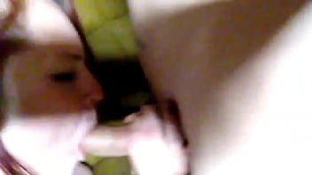 Red head swallows cock