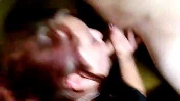 Red head swallows cock