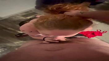 Ginger milf gagged while on her knees