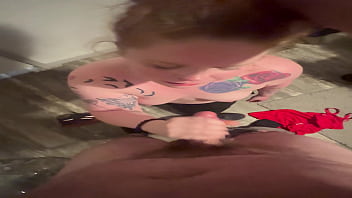 Ginger milf gagged while on her knees