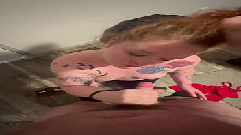 Ginger milf gagged while on her knees