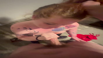 Ginger milf gagged while on her knees