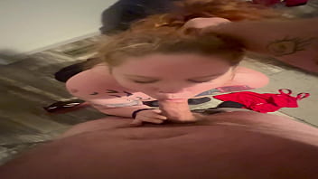 Ginger milf gagged while on her knees