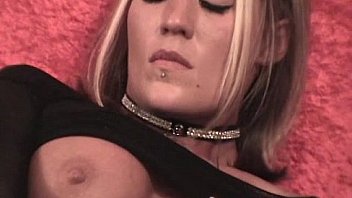 Punk teenager tries out a brand new toy