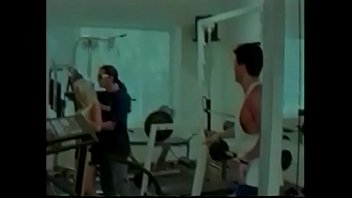 Blonde fucked by two males in the gym Blonde fucked by two males in the gym