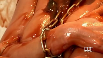 Chained babe peeing & bathing in red juice