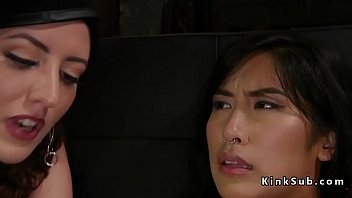 Pierced asian slave butt plugged in threesome