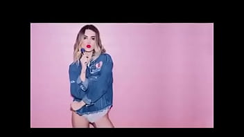 Horny brunette loves to show off her curves in videos