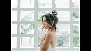 Horny brunette loves to show off her curves in videos