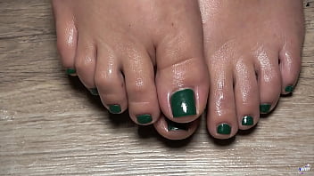 A close up view of my toes finger green nails useful to live your fetish