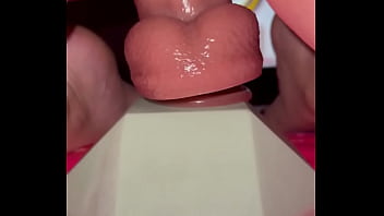 Tiny redhead rides a fence post cock